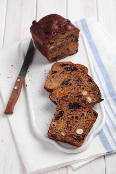 istock Fruchtebrot, traditional Austrian and German fruit bread with raisins, hazelnuts, and other fruits 1208389407