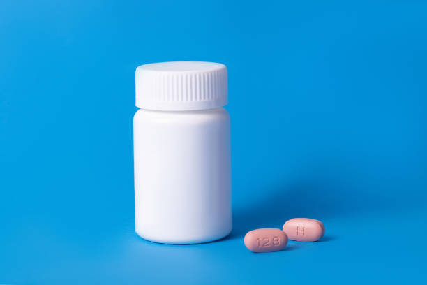 istock hiv therapy pills on blue background 1208393737