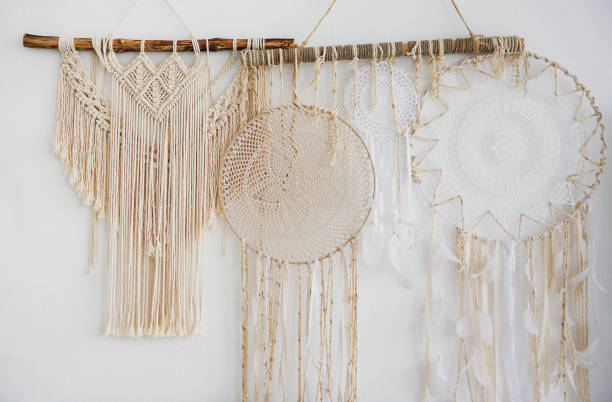 istock Interior of bedroom with bed in boho style decor macram 1208395346
