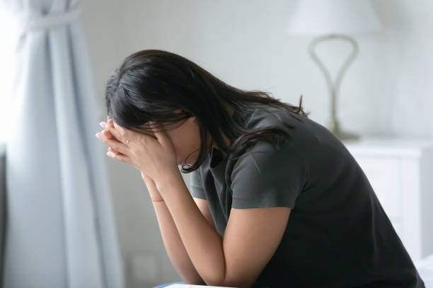 istock Unhappy young woman feel stressed suffering from depression 1208397631