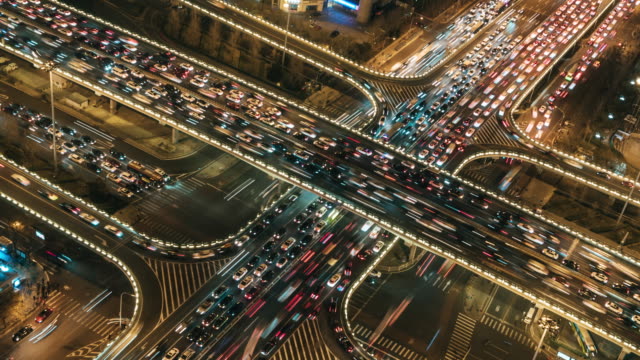 Aerial View of Overpass and City Traffic at Night / Beijing, China