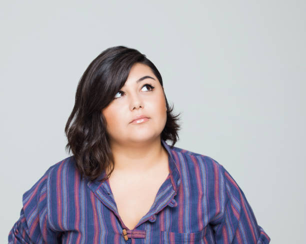 istock Thoughtful young woman 1208402051