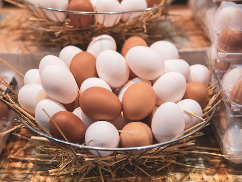 basket of white and brown eggs