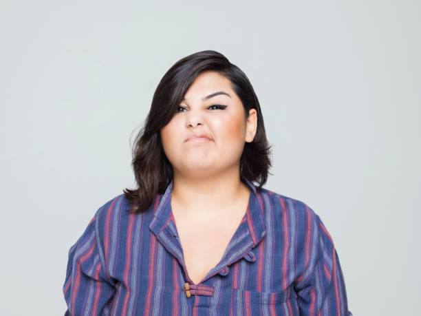 istock Boring young woman  making a face 1208410060