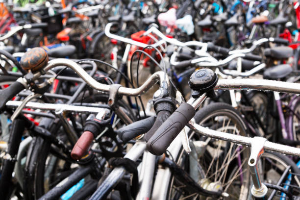 istock Bicycles parked outside Amsterdam Central Station. Close up one old bicycle 1208412545