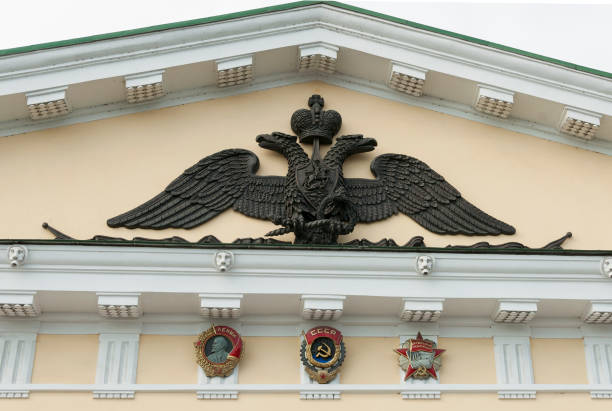 Emblem in the form of  double-headed eagle on the metal fence