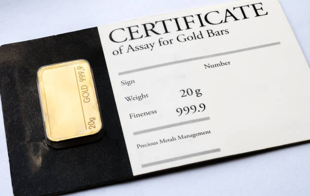 istock Minted gold bar weighing 20 grams with certificate in blister 1208414125