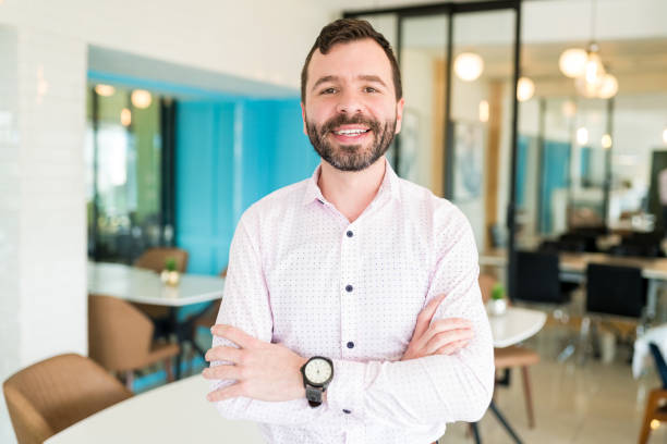 istock Businessman Standing Confidently In Office 1208414244