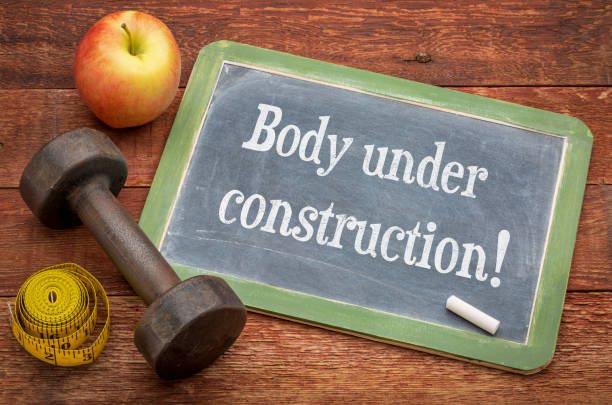 istock body under construction - fitness concept 1208414397