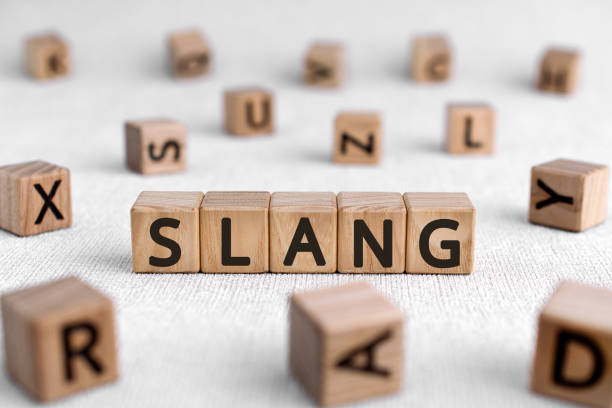 Slang - words from wooden blocks with letters stock photo