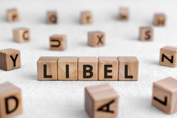 Libel - words from wooden blocks with letters stock photo