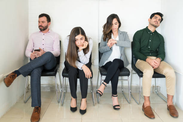 istock Candidates Waiting For Their Turn During Job Interview 1208414991