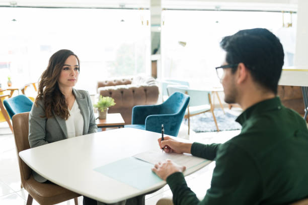 istock Applicant Sitting With Recruiter At Office 1208416051