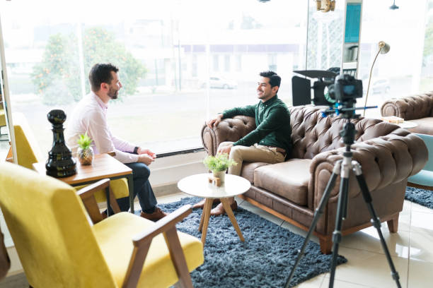 istock Journalist With Businessman During Corporate Interview 1208416403
