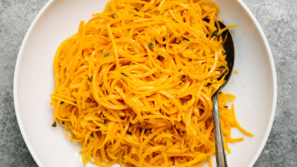 istock Butternut squash noodles cooked in sage butter 1208417177