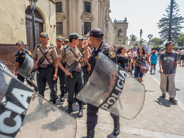 Soldiers on the street of Lima LIma, Peru - March  29, 2018: Armed riot police on the streets of Lima. Policia. South America. Chest Protector stock pictures, royalty-free photos & images