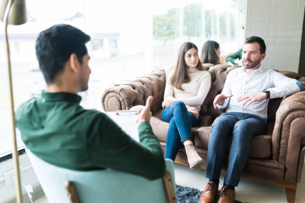 istock Unhappy Couple At Therapy Session With Psychologist 1208419312