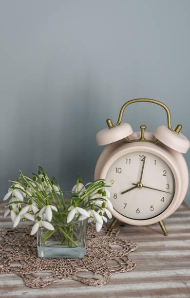 istock Glass vase with snowdrops 1208419549