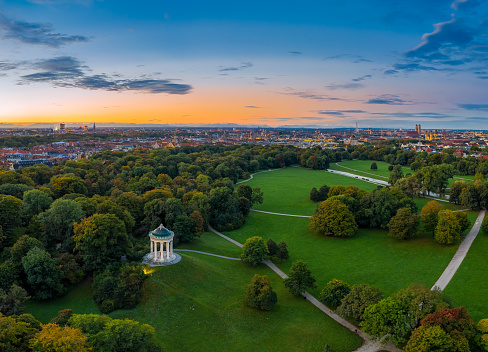The beautiful morning mood in autumn by a flight over the English Garden of Munich, Bavaria.