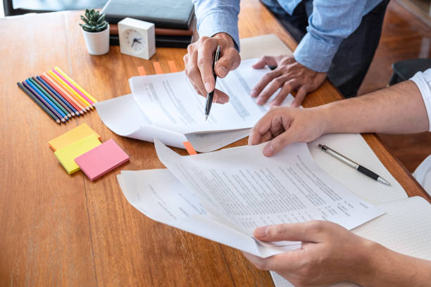 istock Tutor books with friends education, Group students studying and teaching helping and study course with books in library for learning tutoring homework a test or exam 1208421252