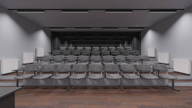 istock Front View of the Seats Inside an Illuminated Lecture Room 1208422415