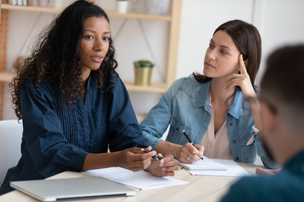 istock Biracial boss explaining business strategy to colleagues. 1208424298