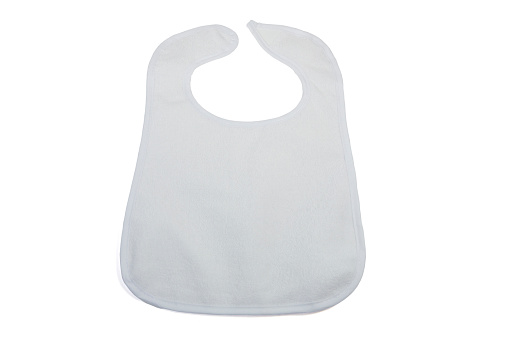 A white baby bib isolated on a white background.