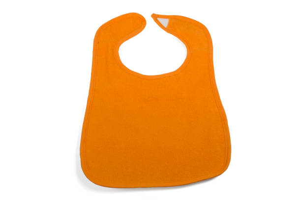 istock Orange Baby Bib Isolated on White Background 1208428189
