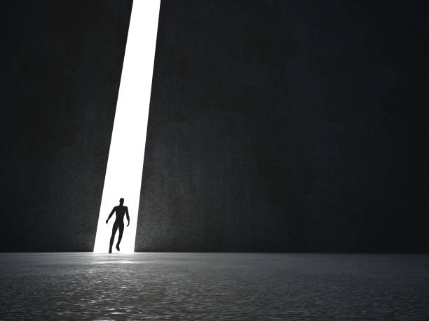 istock Man stands in the light of opening. 3d rendering 1208430495