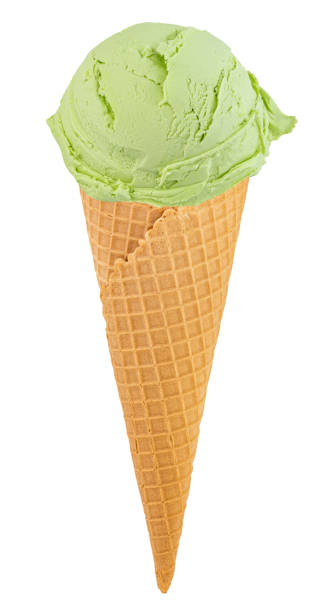 istock pistachio ice cream in the cone on white background with clipping path 1208431517