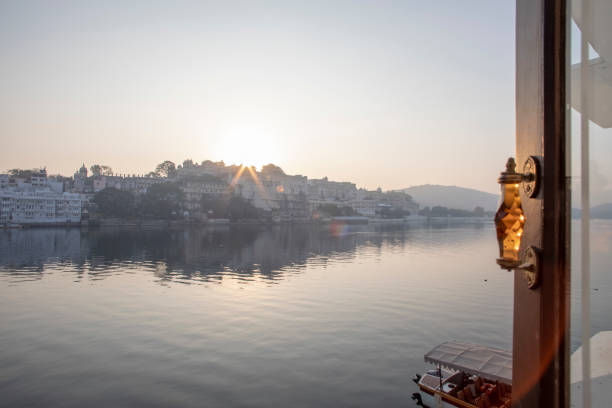 istock View from a ghat at sunrise, across lake 1208434495