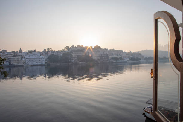 istock View from a ghat at sunrise, across lake 1208434543
