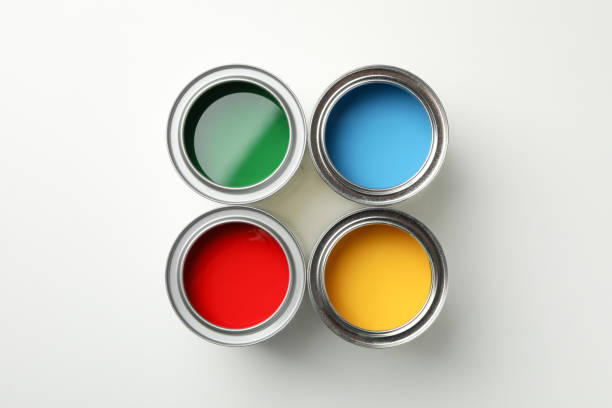 istock Cans of different paints on white background, top view 1208434808