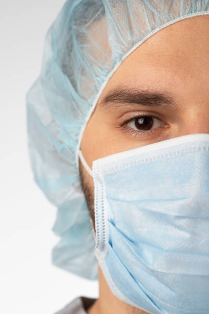 istock Doctor in scrubs 1208435551