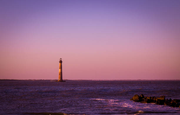 istock folly beach lighthouse south carolina 1208437518