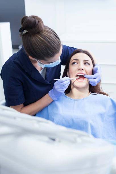 istock Female patient in the dentist's office 1208438033
