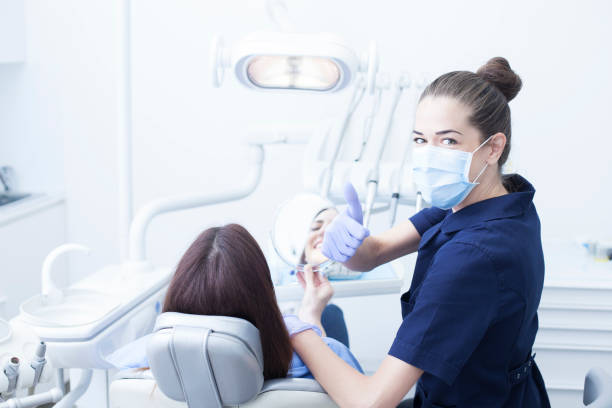 istock Female patient in the dentist's office 1208438055