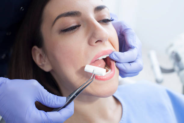 istock Female patient in the dentist's office 1208438111
