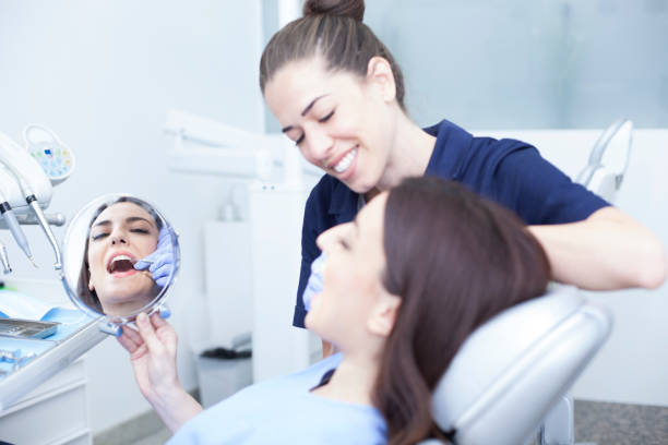istock Female patient in the dentist's office 1208438148