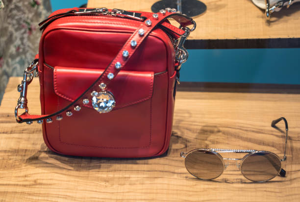 istock Women branded purses in a store 1208438355