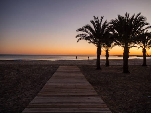 Sunset on the beach of Levante de Santa Pola, Alicante, Spain