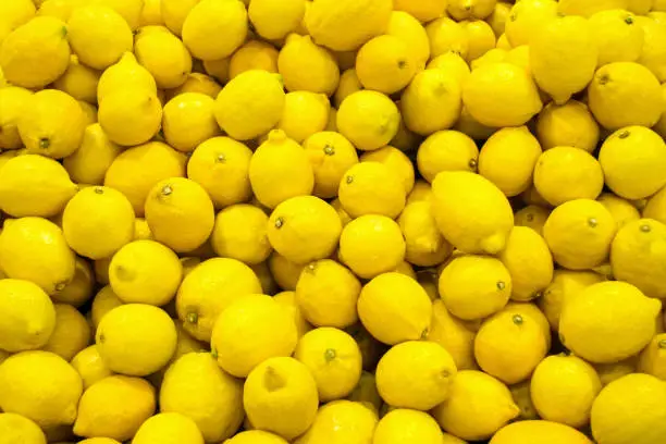 Photo of many of fresh lemons closeup wallpaper