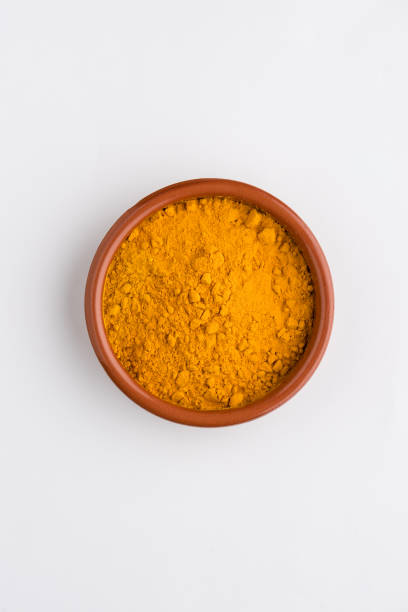 istock Heap of curcuma detail 1208442051