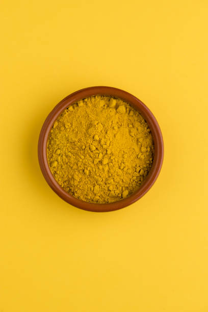 istock Heap of curcuma detail 1208442579