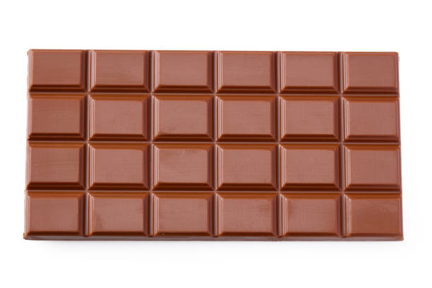 istock Milk chocolate bar isolated on white background. top view 1208443074