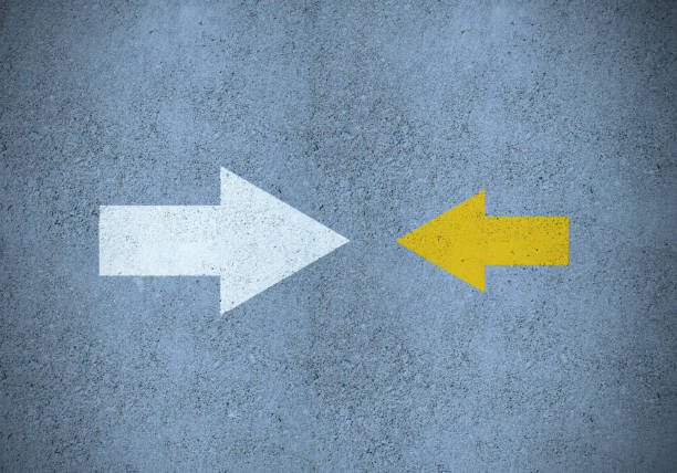 istock Strong  white (idea) arrow against smaller yellow (method) 1208443836