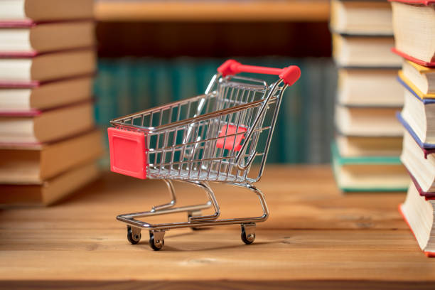 istock Books and a shopping cart 1208447931