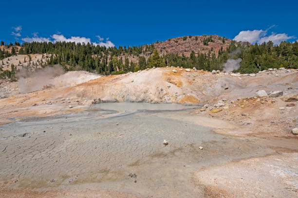 istock Steaming Pond and Colorful Mud 1208451489