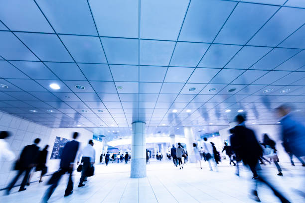 istock Commuters Walking Through Pedestrian Walkway Busily 1208460752