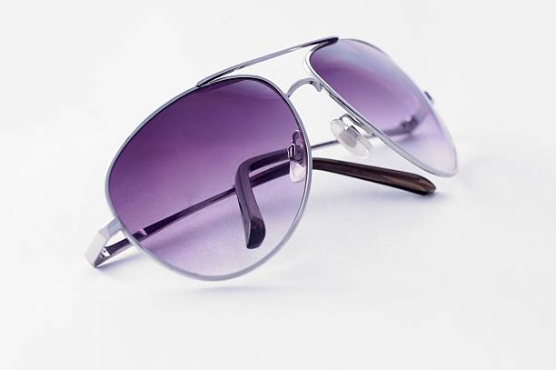 istock Purple sunglasses isolated on white background 120846255